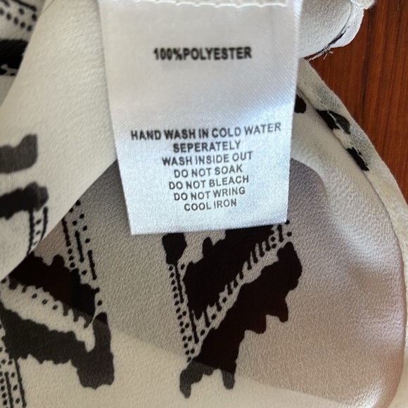 Black and white abstract print sheer blouse. Size small - Picture 7 of 7